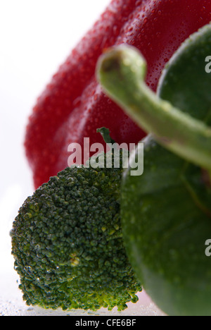 Close up of broccoli and pappers isolated on white Stock Photo