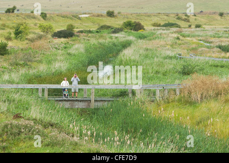 Family visiting nature reserve Rainham Marshes RSPB Reserve Essex, UK LA005529 Stock Photo