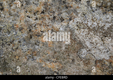 Close-up of dressed granite wall-stone. Stock Photo