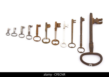 Assortment of skeleton keys cut out on white background. Stock Photo