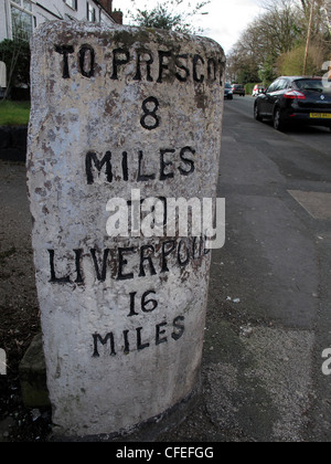 Milepost To Prescot 8 Miles, Liverpool 16 Miles on A57 at Liverpool Road, Penketh, Cheshire, England UK Stock Photo