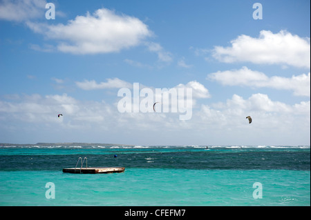 Parakites and raft in Caribbean, Orient Beach, Saint Martin Stock Photo