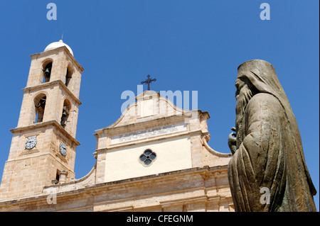 Statue of a Greek Orthodox priest in front of the Orthodox Cathedral in the beautiful Venetian harbour town of Chania Stock Photo