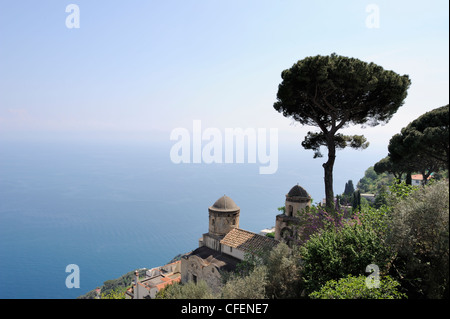A fine view to the Bay of Salerno, to the cupolas of the 13th century church Santissima Annunziata with a dramatic umbrella pine Stock Photo