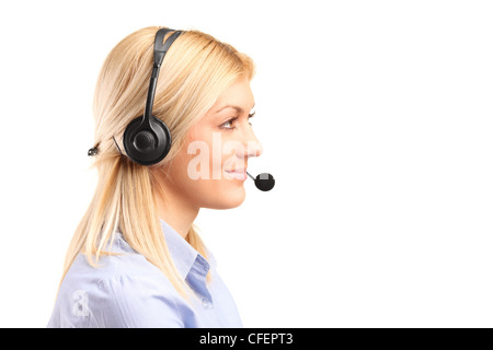 Portrait of a blond female customer service operator wearing a headset isolated on white background Stock Photo