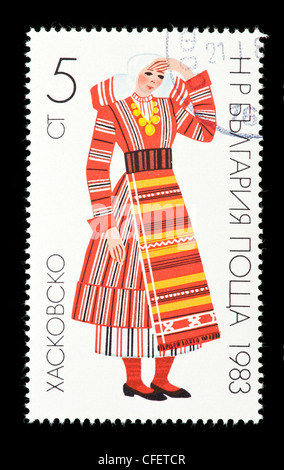 Postage stamp from Bulgaria depicting a woman from Khaskovo in local clothing. Stock Photo