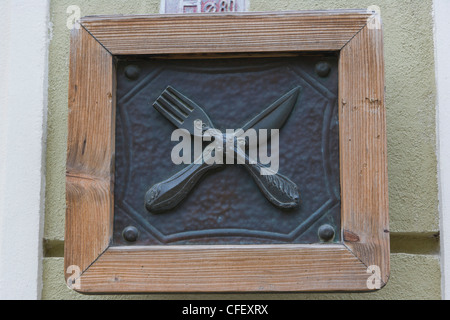 Crossed knife and fork, restaurant, signboard, Grodzka, Old Town, Krakow, Cracow, Malopolska Province, Poland Stock Photo