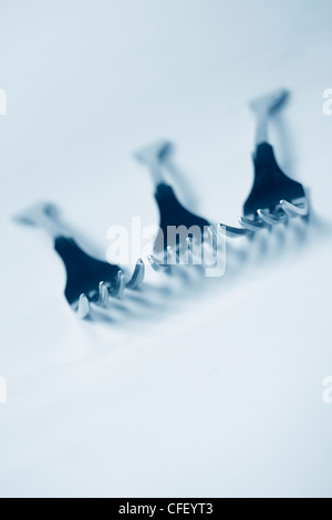 Steel forks in modern blue Stock Photo