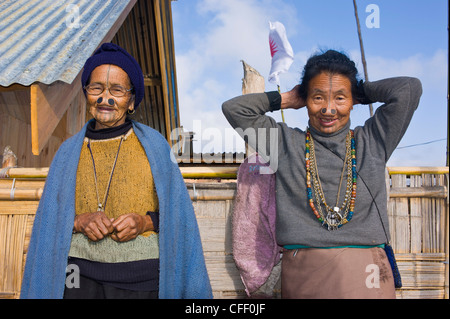 Old women of the Apatani tribe famous for the wooden pieces in their nose to make them ugly, Ziro, Arunachal Pradesh, India Stock Photo