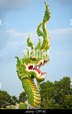 green water dragon statue in Krabi, Thailand Stock Photo