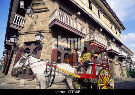 Philippines, Manila, Intramuros Historical District, Horse-drawn Carriage and Spanish Colonial Building Stock Photo