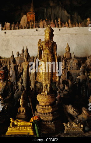 Buddha statues, Pak Ou caves, Mekong river north of Luang Prabang, Laos Stock Photo