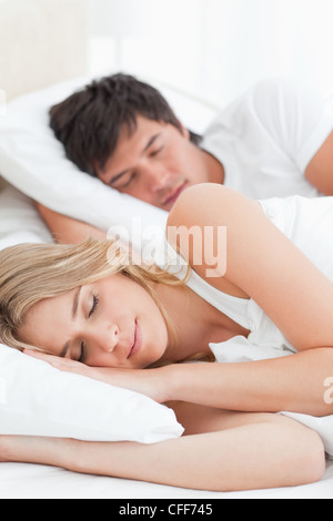 Close up of a young man sleeping on his textbook Stock Photo - Alamy
