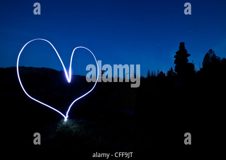 A light painting of a heart at sunset in Idaho.