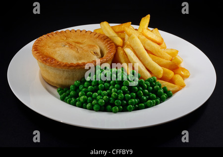 Pie and chips with peas. A traditional British Bar Dish Stock Photo