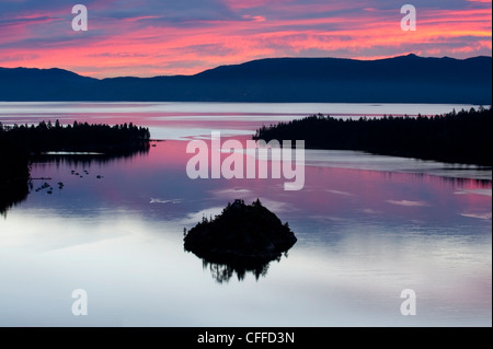 A silhouette of Fannette Island in Emerarld Bay during a beautiful sunrise in Lake Tahoe, CA. Stock Photo