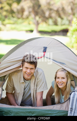 A camping couple really enjoying their getaway Stock Photo