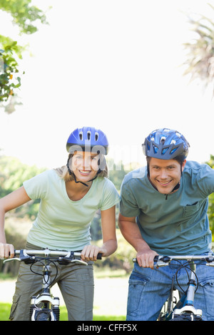 Couple spending their time on their bikes Stock Photo