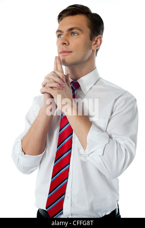 Mature male executive thinking isolated over white background Stock Photo