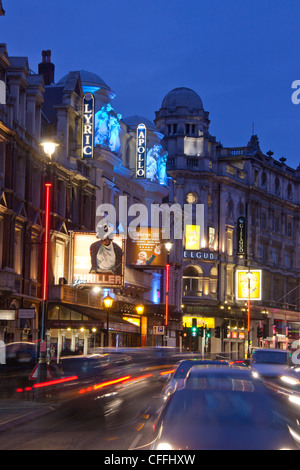 London Theatreland West End Shaftesbury Avenue busy at night with traffic trails London England UK Stock Photo