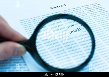 a magnifying glass is on a very small print terms and conditions Stock  Photo - Alamy