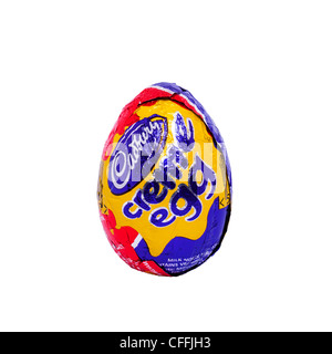 A Cadbury creme egg chocolate Easter egg on a white background Stock Photo