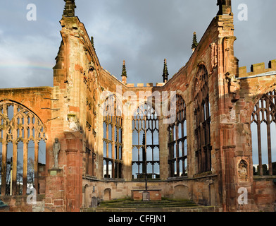 The altar of the old bombed out cathedral in late afternoon sunshine after a storm, Coventry, West Midlands, England, UK Stock Photo