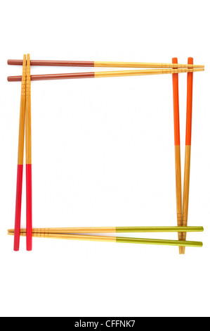 Decorative frame of bamboo chopsticks isolated on a white. Stock Photo