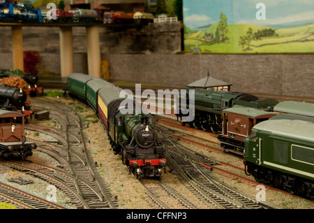 Model Railway Layout showing various trains and models Stock Photo