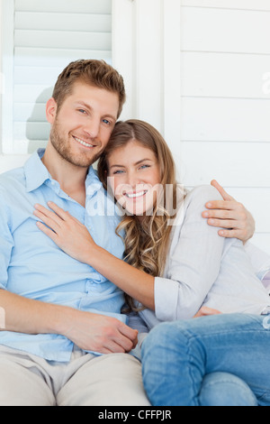 Close up of a man and woman smiling and embracing Stock Photo