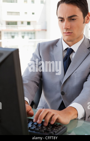 Businessman working on his computer Stock Photo