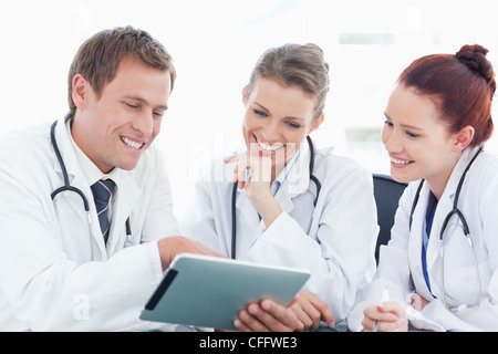 Doctors using tablet Stock Photo