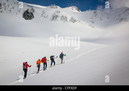 Snowshoers on the Mazama Ridge snowshoe trail on Mount Rainier in Washington state Stock Photo