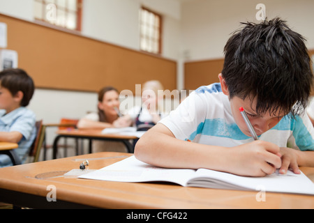 Student working focused on his exercises Stock Photo