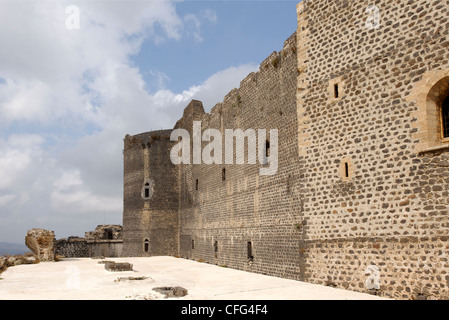 Qalaat Marqab. Syria. Partial view of the donjon the great central tower along the south east side of the crusaders castle. The Stock Photo