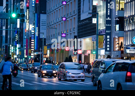 Street traffic and neon lights at night in the Ginza district of Tokyo,Japan