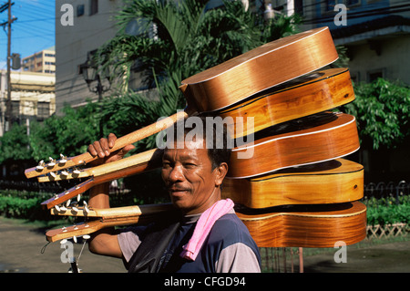 Philippines, Cebu, Cebu City, Guitar Vendor Stock Photo