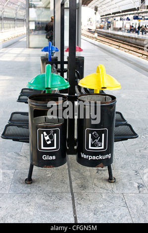 Recycling bins on train platform in Berlin, Germany. Stock Photo