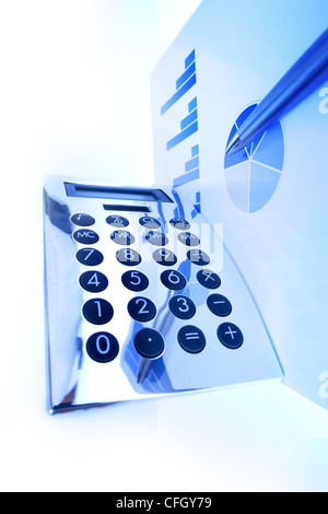 blue finance graph on an office desk Stock Photo