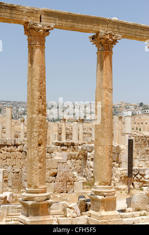 Jerash. Jordan. View of section of columns from the colonnaded street or Cardo Maximus. Paved with original flag stones and Stock Photo