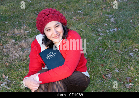 Hispanic woman in park. Stock Photo