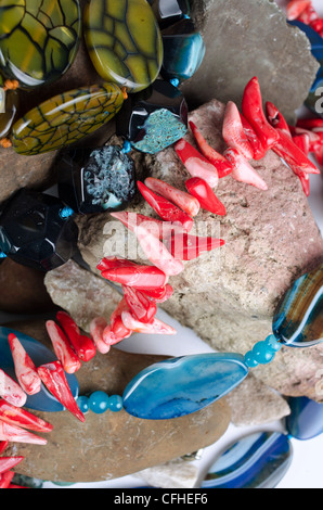 Close up of many different colorful natural gems: agate onyx, coral Stock Photo