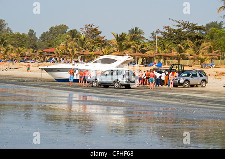 A large yacht grounded ashore on Kololi beach Gambia west Africa Stock Photo