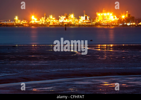 A view of the Marine Jetty at Fawley oil refinery across Southampton Water Stock Photo