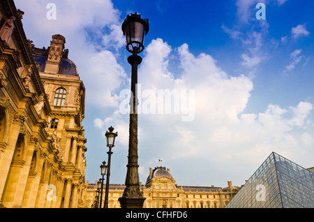 Lamp posts and courtyard at the Louvre Palace, Louvre Museum, Paris, France Stock Photo