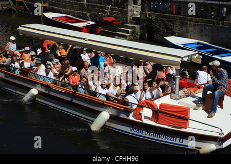 Boat trip on the River Dronne which surrounds Brantome in the Dordogne region of France Stock Photo