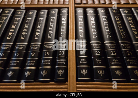 Home library shelves with 20th century edition (1988) of Encyclopedia Britannica in classic binding Stock Photo