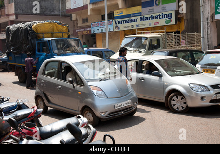 A Tata Nano car on the street in Goa India Stock Photo