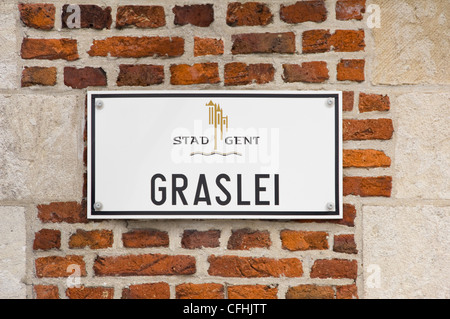 Horizontal close up of the street sign for Graslei in the old town centre of Ghent. Stock Photo