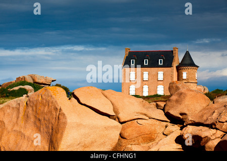 Historic Cottage on the Cote De Granite Rose Stock Photo